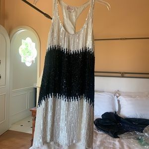 Fun and flirty black & white sequin dress